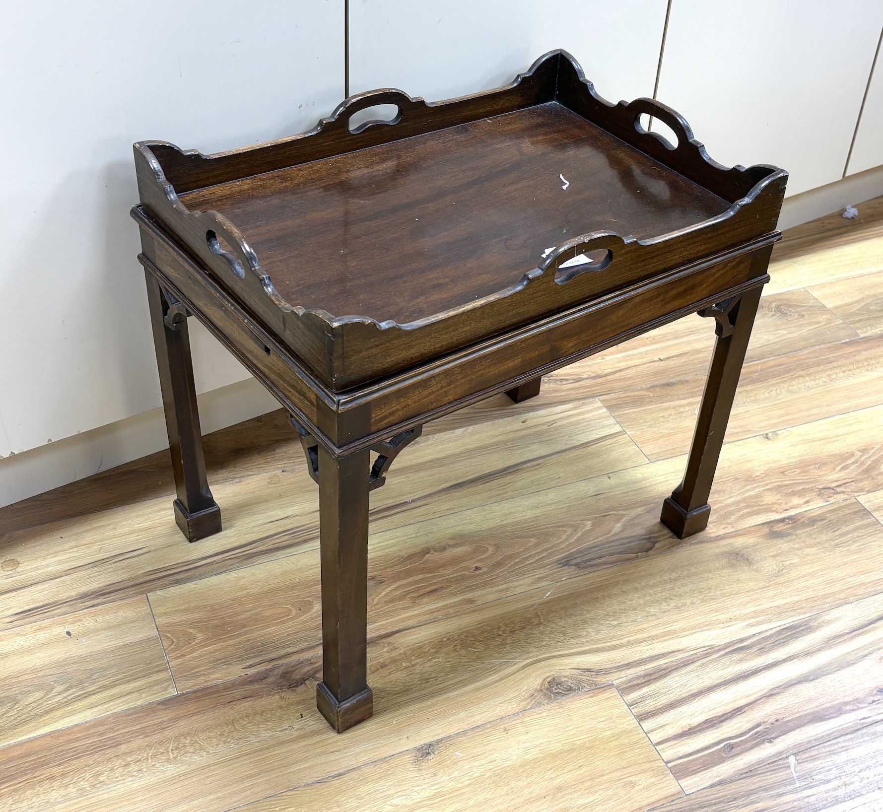 A George III style rectangular mahogany butler’s tray on stand, width 56cm, depth 39cm, height 51cm